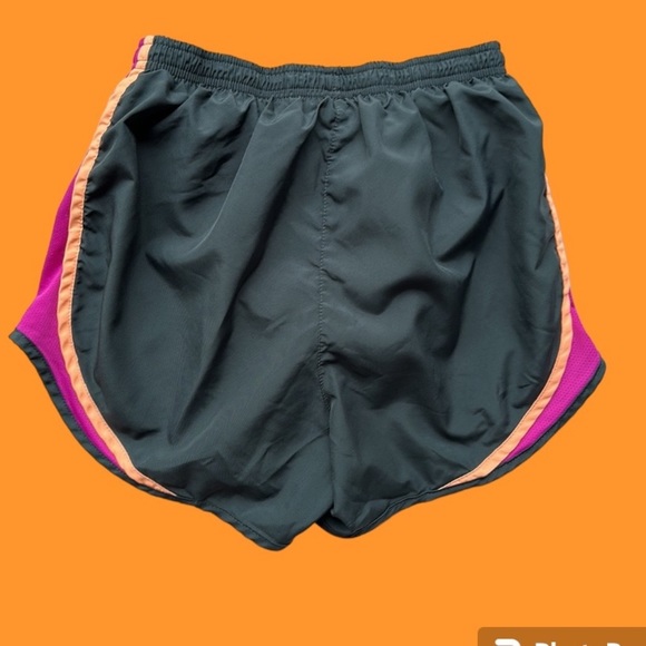 Nike DriFit running shorts in black with purple and orange trim - Picture 2 of 9